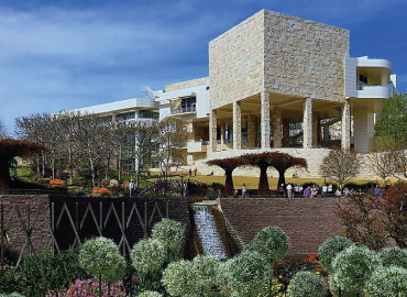 Getty Museum white marble building, with a garden on the foreground.